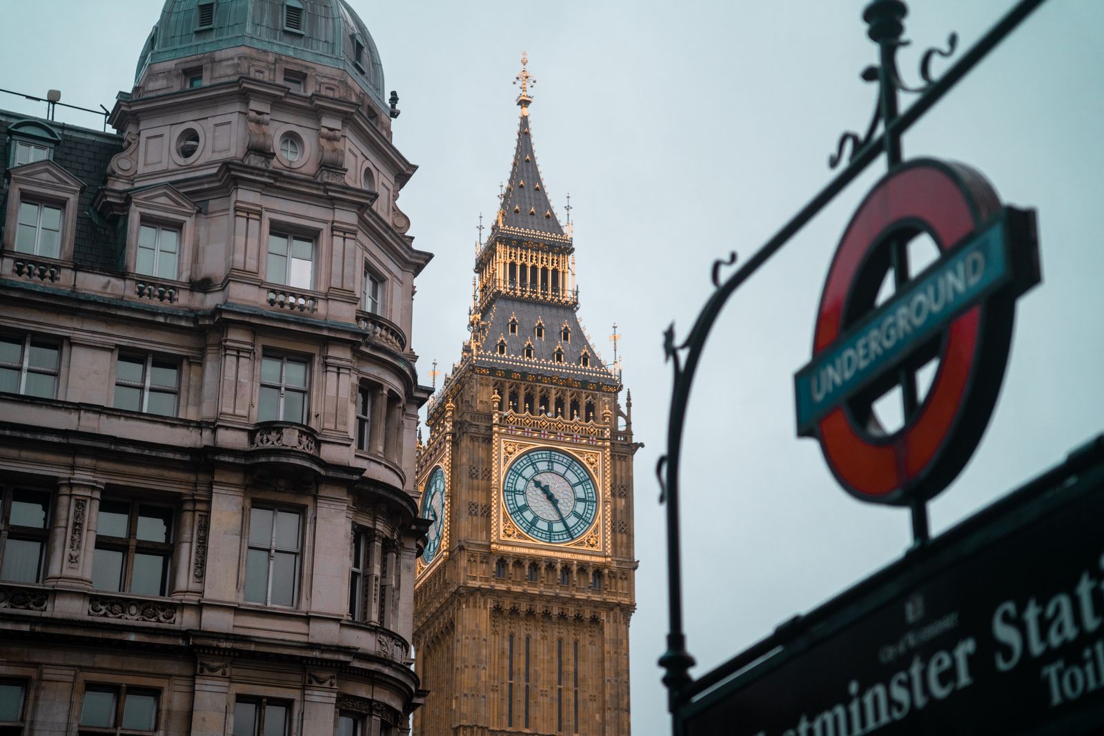 Captivating view of Big Ben with Westminster and Underground sign in London.